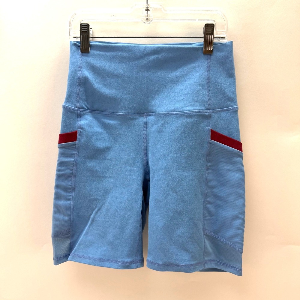 Fabletics On-the-Go Ultra High-Waisted 7" Short surf blue cherry Burst size XS